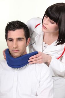 The doctor puts the Shantz collar on the patient